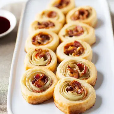 Irresistible Palmiers with Bacon, Swiss, and Caramelized Onions 10 Palmiers with Bacon, Swiss, and Caramelized Onions