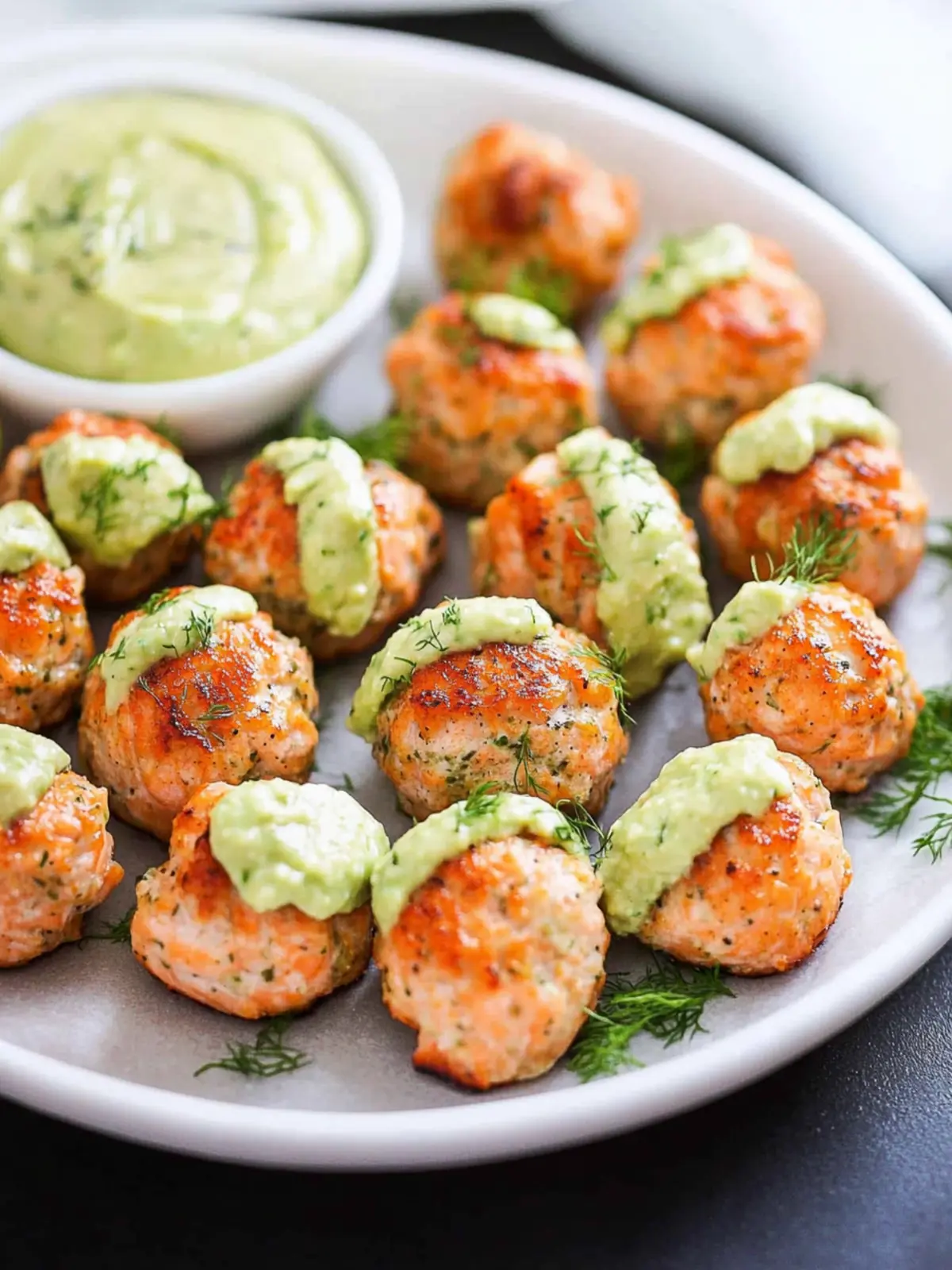 Zesty Baked Salmon Meatballs with Creamy Avocado Sauce Delight 2 Baked Salmon Meatballs with Creamy Avocado Sauce